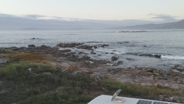 Amazing drone aerial landscape view of mountains in atlantic ocean with waves in Galiza, Spain alt
