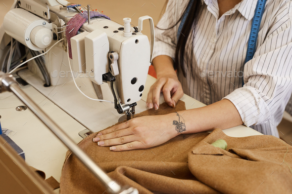 Woman sewing dress