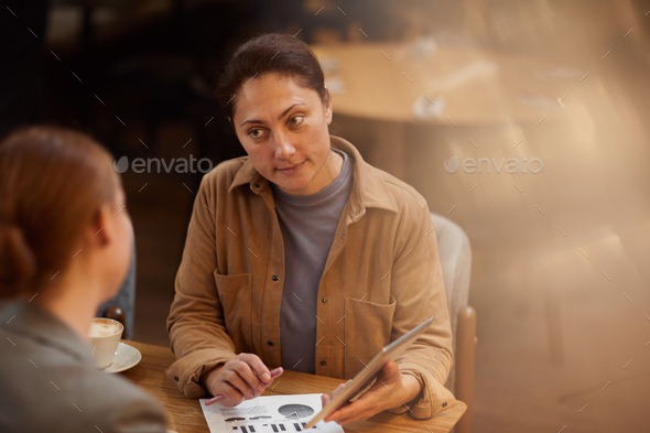 People at meeting in cafe - Stock Photo - Images