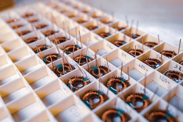 Many twisted copper coils lie - Stock Photo - Images