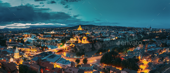 Tbilisi, Georgia. Evening Night View Of Georgian Capital Skyline. Scenic Top View Of Summer Evening - Stock Photo - Images