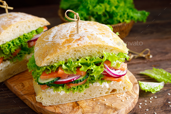 Sandwiches with homemade ciabatta bread, salted salmon - Stock Photo - Images
