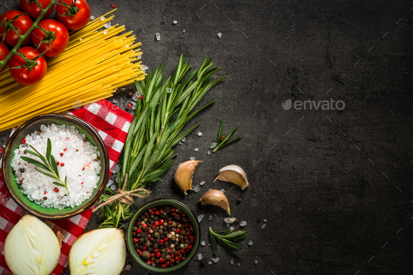 Food cooking background on black kitchen table - Stock Photo - Images