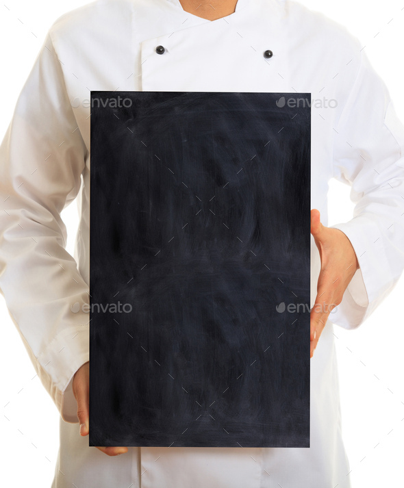 Chef wearing white uniform, holds a blank black billboard, standing on white background.