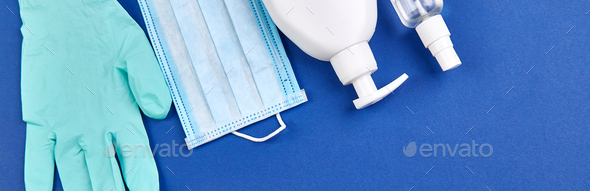 Banner Flat lay of Coronavirus protection, medical protective masks, gloves, hand sanitizer bottles - Stock Photo - Images