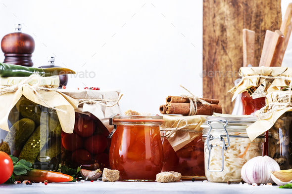 Canned food concept. Fermented, pickled, marinated preserved vegetarian food - Stock Photo - Images