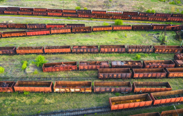 Aerial view of freight trains. Top view of old rusty wagons - Stock Photo - Images