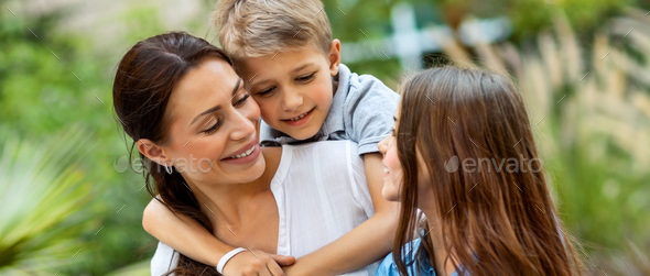 Happy family outdoors - Stock Photo - Images