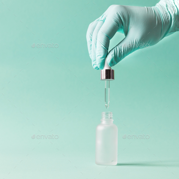 Dropper glass Bottle Branding Mock-Up. Concept organic and beauty cosmetics. - Stock Photo - Images