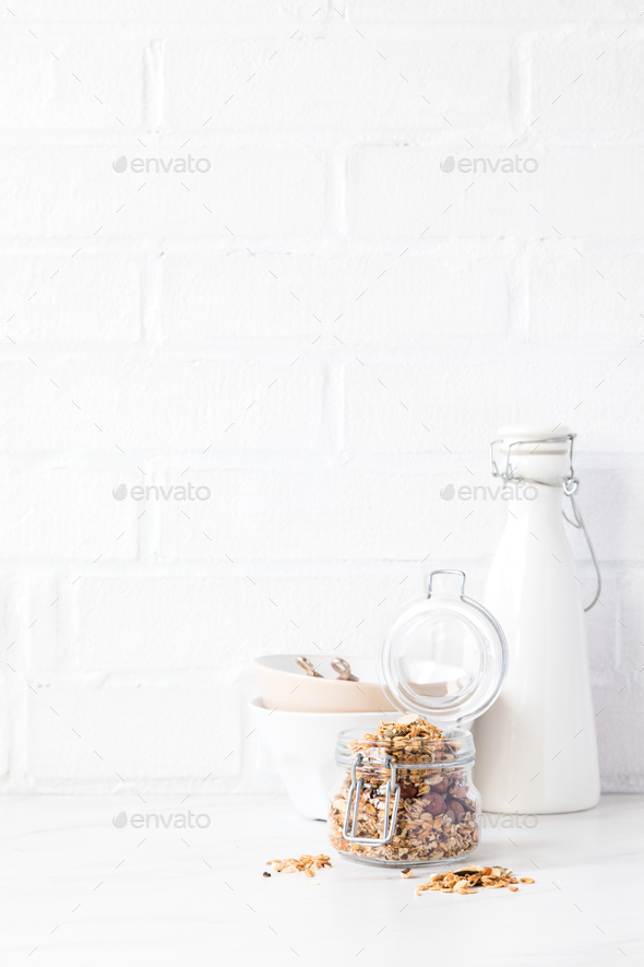 Granola, muesli with vegetable milk. Breakfast, snack.Concept of healthy and dietary nutrition. - Stock Photo - Images