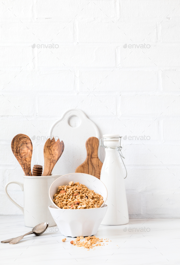 Granola, muesli with vegetable milk. Breakfast, snack.Concept of healthy and dietary nutrition. - Stock Photo - Images