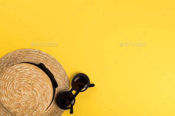 Straw Beach Woman's Hat Sun Glasses .Summer time vacation concept.Travel mood to the sea.