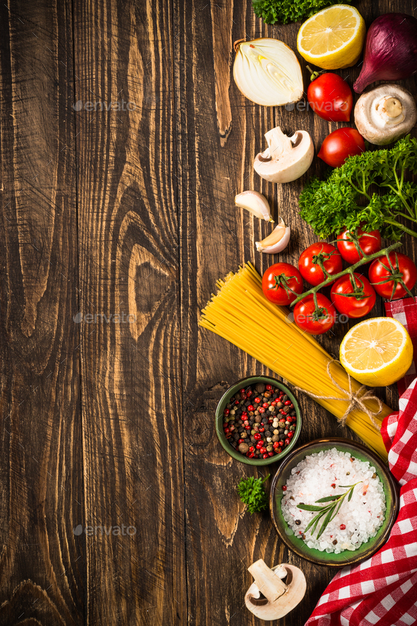 Food cooking background on wooden kitchen table Stock Photo by Nadianb