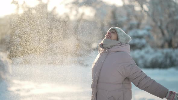 Sliw Motion Girl at Winter Time Walks and Haves Fun Outdoors alt