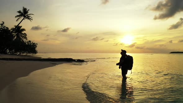 One girl tans on exotic tourist beach time by transparent lagoon with white sand background of the M alt