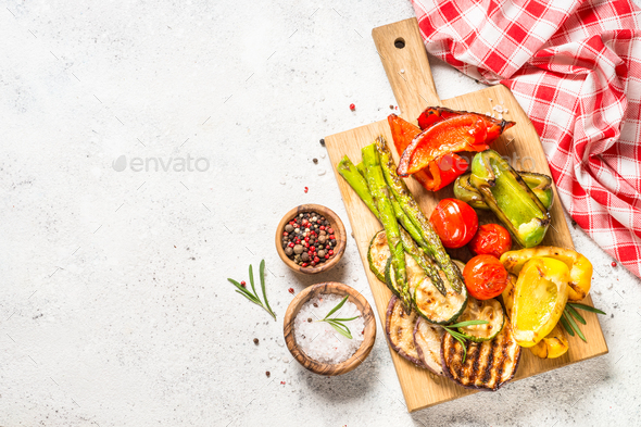 Grilled vegetables - zucchini, paprika, eggplant, asparagus and tomatoes - Stock Photo - Images