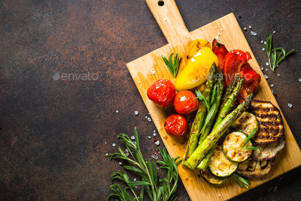 Grilled vegetables - zucchini, paprika, eggplant, asparagus and tomatoes - Stock Photo - Images