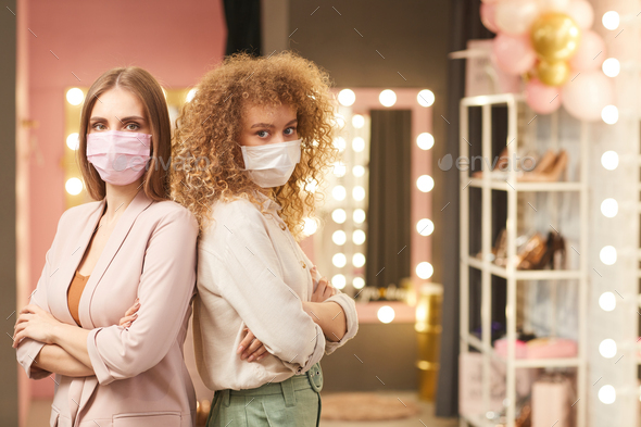 Two Beautiful Women Wearing Face Masks - Stock Photo - Images