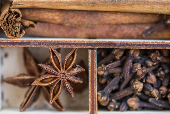 ginger, mint, clove, chili flakes, cardamon, star anise, cinnamo - Stock Photo - Images