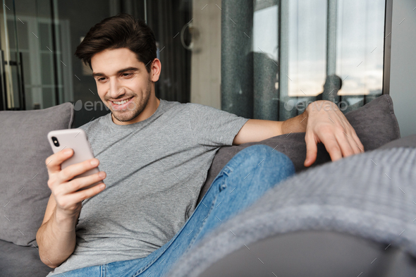 Portrait of an attractive young bearded man - Stock Photo - Images