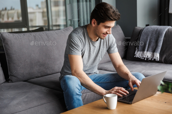 Portrait of an attractive young bearded man - Stock Photo - Images