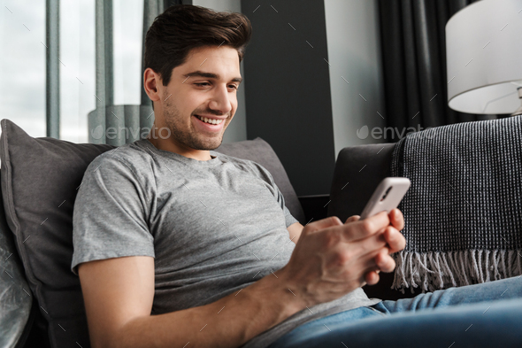 Portrait of an attractive young bearded man - Stock Photo - Images