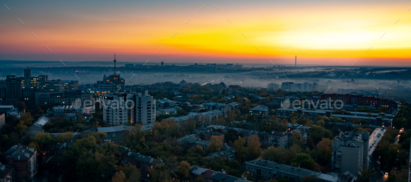 Aerial view fog over a provincial European city - Stock Photo - Images