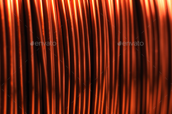 Close-up of a large coil of copper wire - Stock Photo - Images