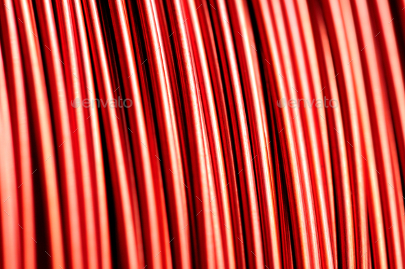 Close-up of a coil of red copper wire - Stock Photo - Images