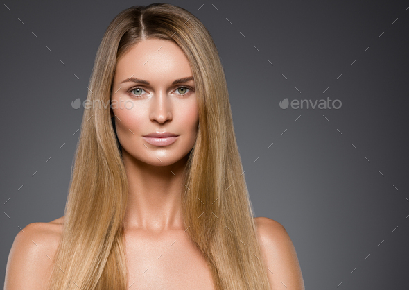 Beauty woman face healthy beautiful skin and blond smooth hair