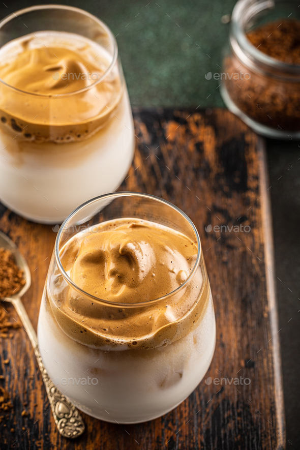 Dalgona coffee in glass cup - Stock Photo - Images