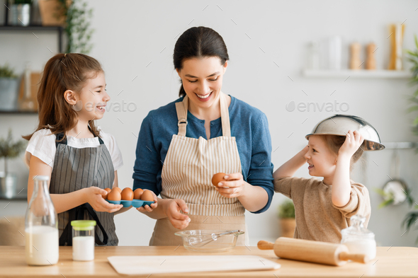 family are preparing bakery together - Stock Photo - Images