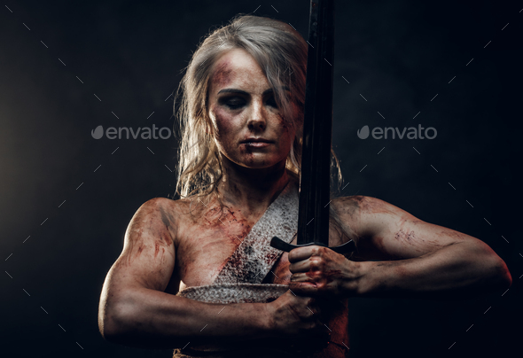 Naked Fantasy woman warrior wearing rag cloth - Stock Photo - Images