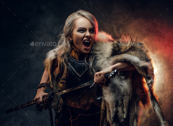 Fantasy woman knight wearing cuirass and fur - Stock Photo - Images