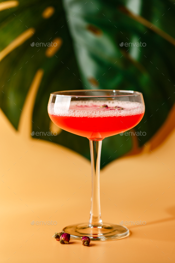 Pink Raspberry Cocktail in drink glass - Stock Photo - Images