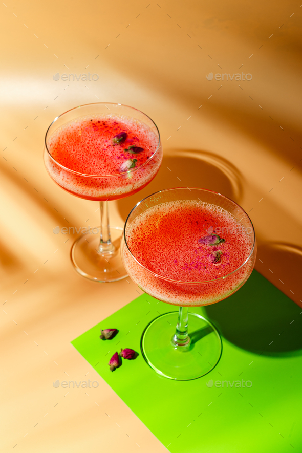 Pink Raspberry Cocktail in drink glass - Stock Photo - Images
