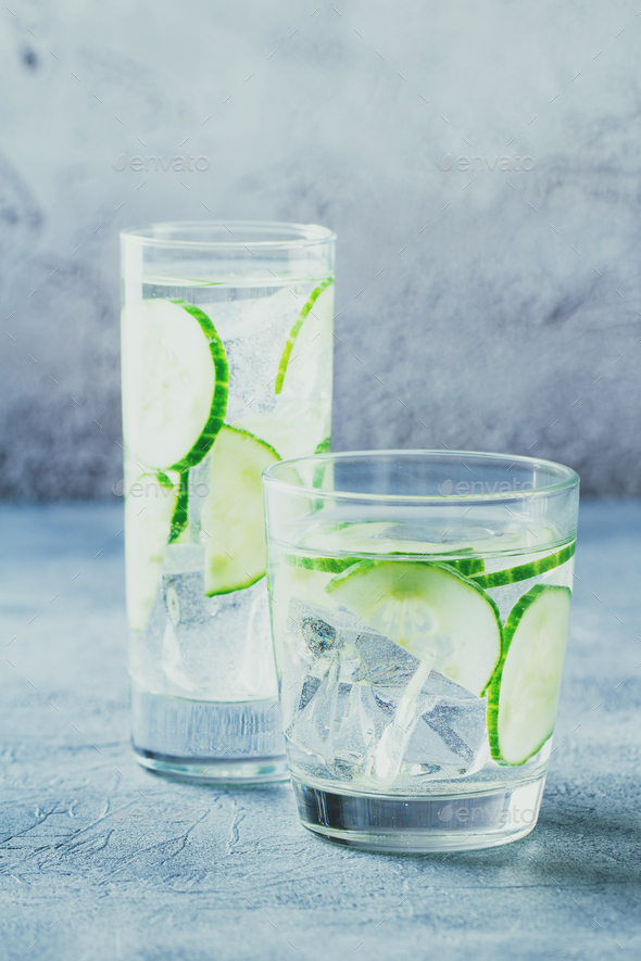 Infused water with cucumber and ice - Stock Photo - Images
