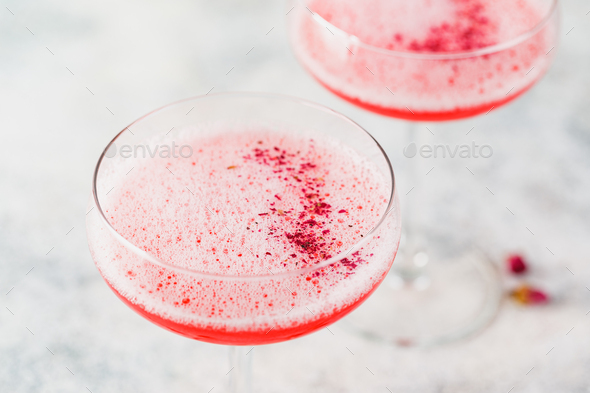Pink Raspberry Cocktail in drink glass - Stock Photo - Images