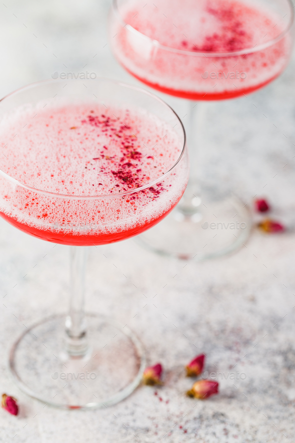 Pink Raspberry Cocktail in drink glass - Stock Photo - Images