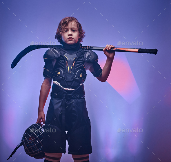 Young female hockey player isolated on white background. Sportswoman  wearing equipment and helmet standing with the stick. Concept of sport,  healthy lifestyle, motion, movement, action Stock Photo - Alamy