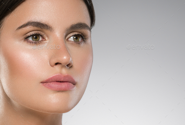 Woman face close up beauty macro eyes lips skin tone