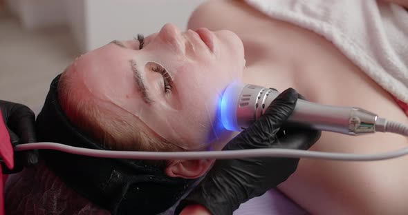 Beautician Does Procedure of the Machine Infrared Face Lifting  60p Prores HQ