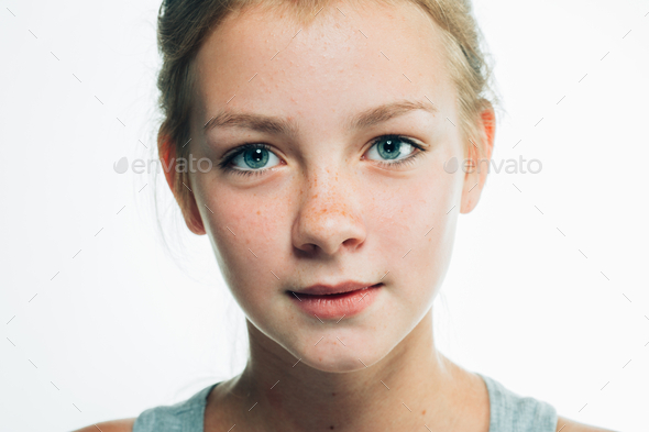 Beautiful model young woman girl portrait with freckles long blonde hair  isolated on white Stock Photo by kiraliffe