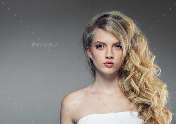 Beautiful Woman Portrait With Fresh Daily Make Up Blonde Curly Hair And Healthy Skin Stock Photo By Kiraliffe