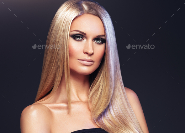 Hair beautiful long blond hairstyle woman fashion makeup healthy skin and hair black background