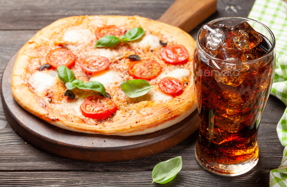 Cola and tasty homemade pizza