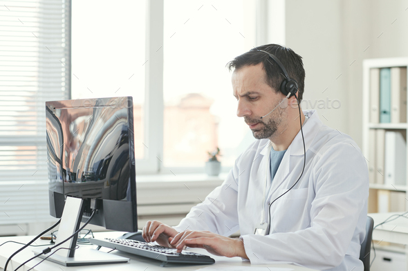Man working in medical call center