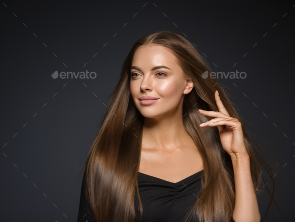 Smooth beauty woman long hair brunette female model natural makeup beautiful girl dark background