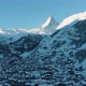 Zermatt Village and Matterhorn Mountain at Sunny Winter Day. Switzerland. Aerial Drone Shot - VideoHive Item for Sale