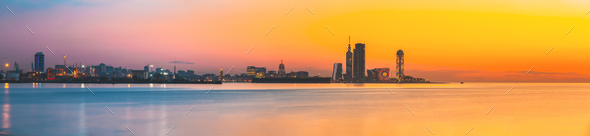 Batumi, Adjara, Georgia. Skyline Of Resort Town At Sunset Sunrise. Bright Orange Evening Sky. View - Stock Photo - Images